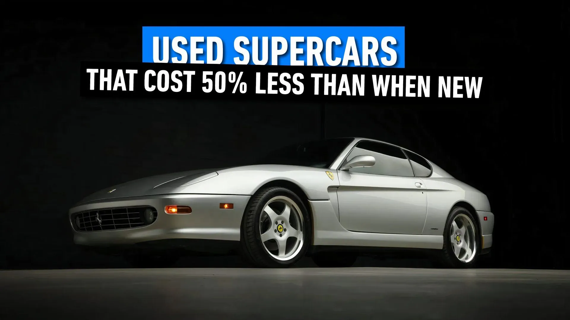 Ferrari 456 in silver side shot from the ground