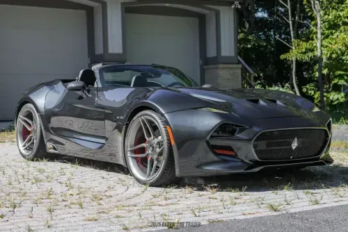 Front quarter view of the VLF Force 1 V10 for sale, showcasing its dark graphite metallic finish and angular, futuristic design.