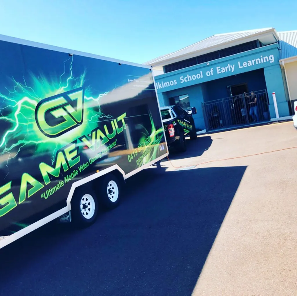 Game Vault's mobile gaming van parked and ready for action, showcasing its sleek design and inviting atmosphere.