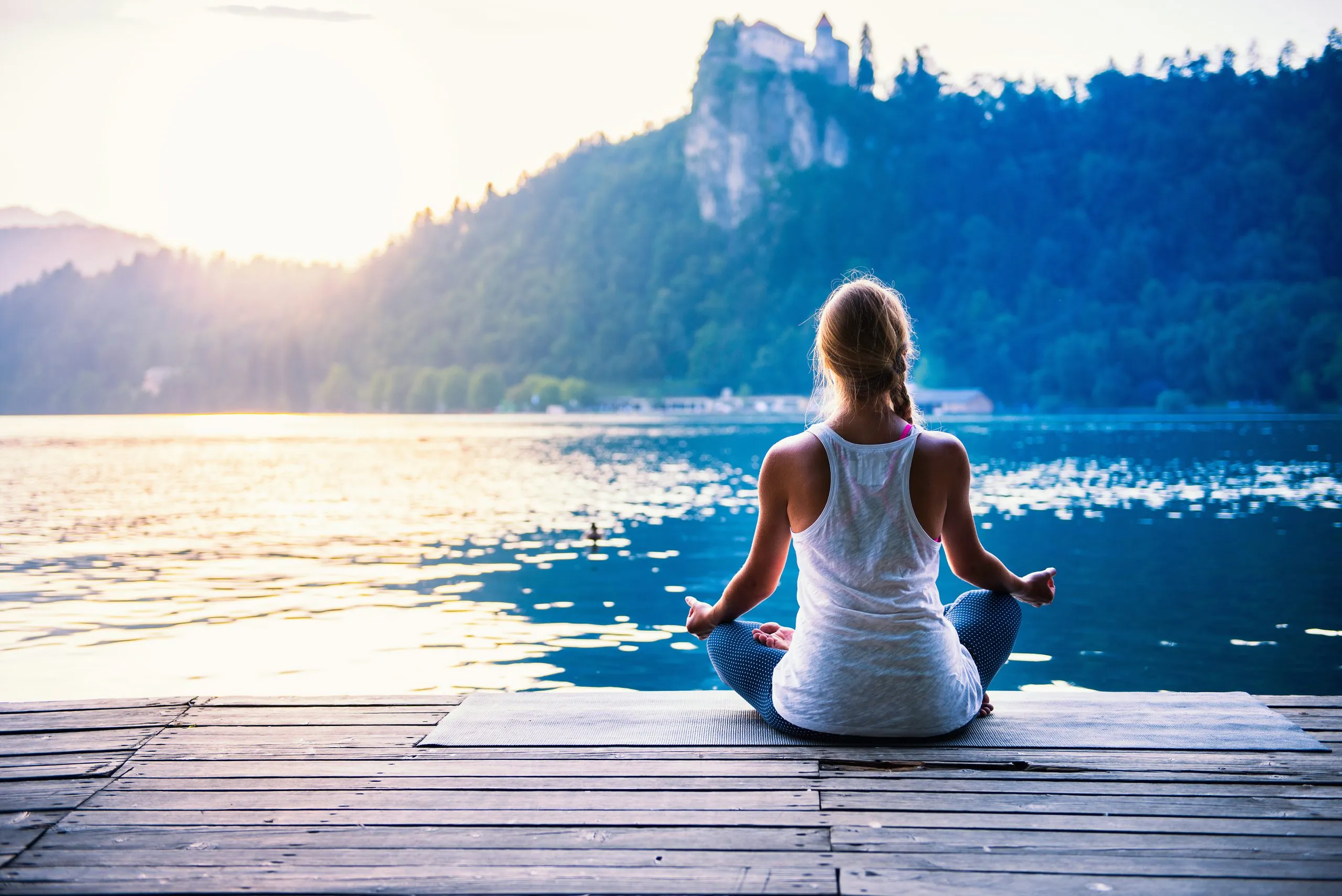Individual practicing mindfulness in a calm setting, emphasizing Finnish mental well-being.