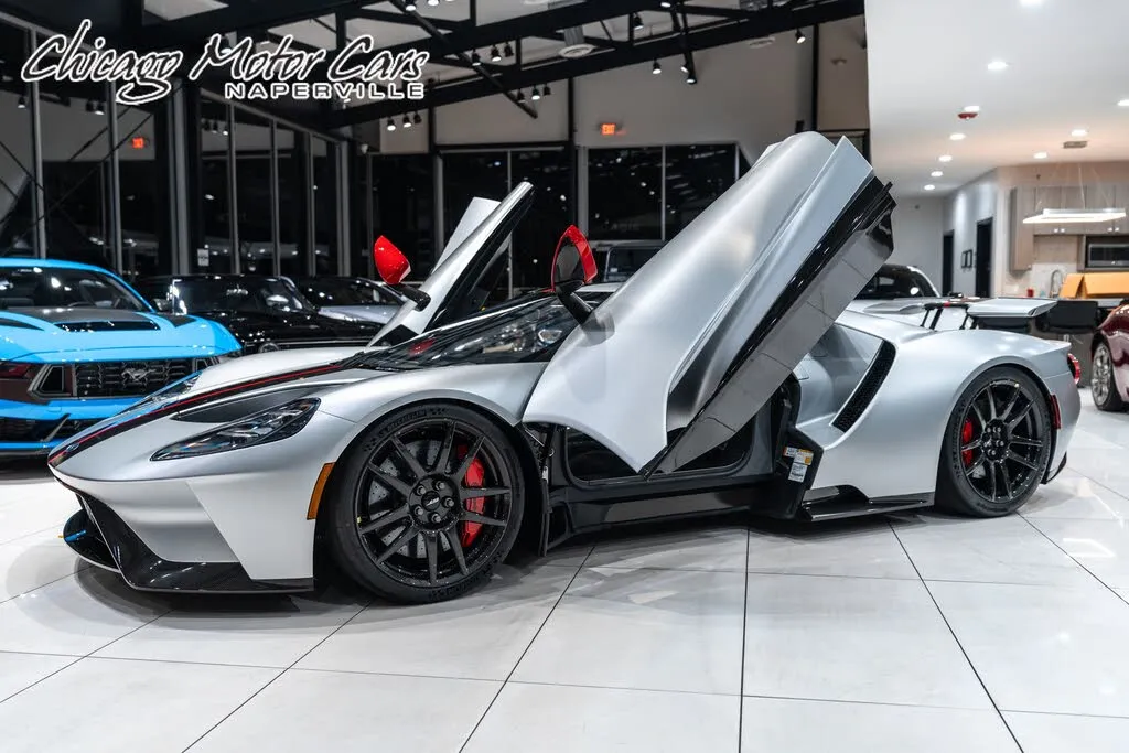 Ingot Silver 2019 Ford GT RWD parked outdoors, showcasing its aerodynamic design