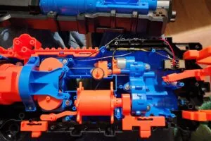 Internal view of the X-Shot Rage Fire, showcasing the flywheel cage and motors