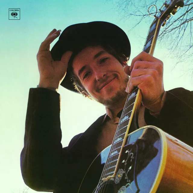 Johnny Cash and Bob Dylan in a legendary musical collaboration.