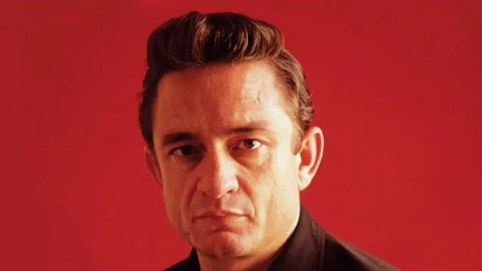 Johnny Cash performing on stage