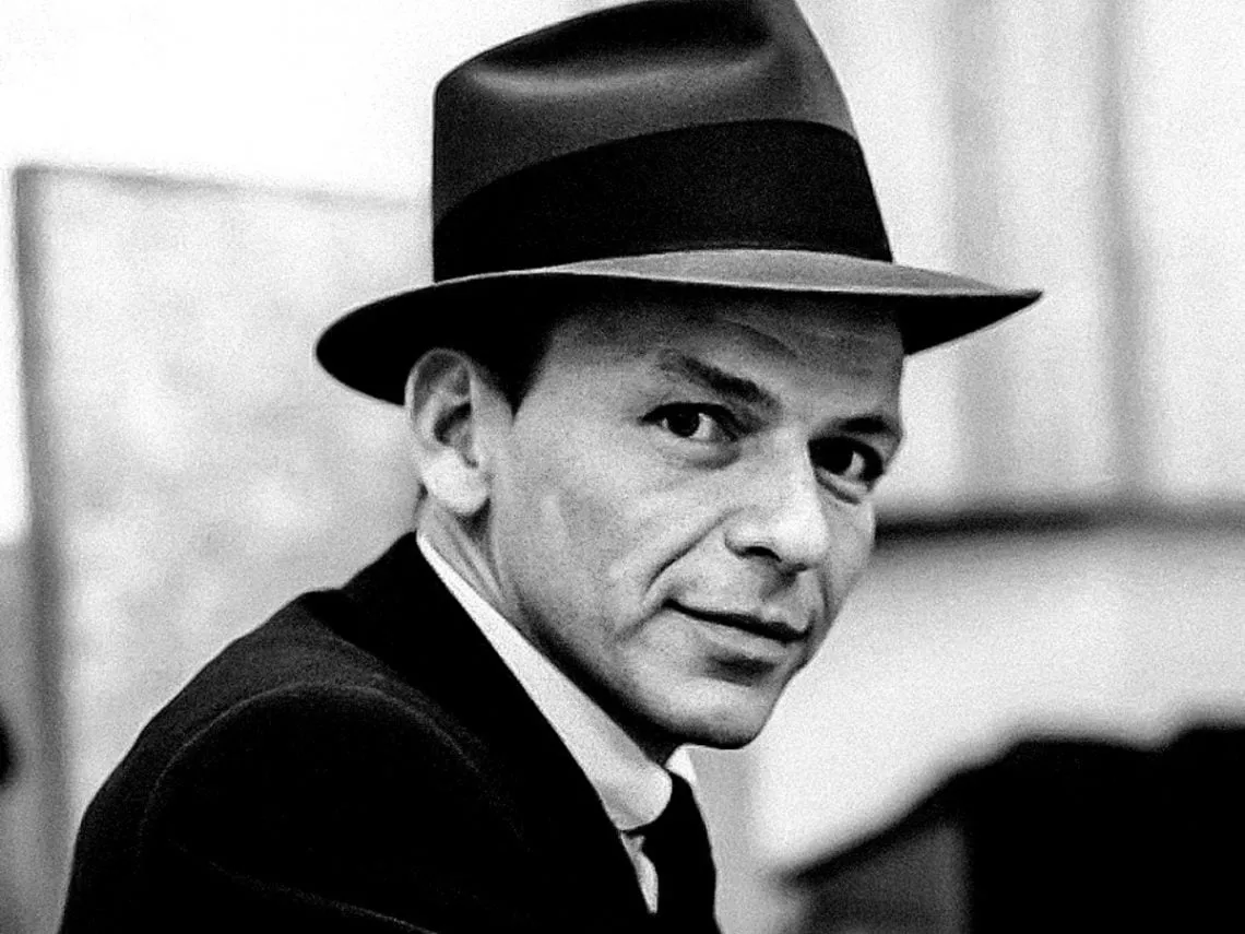Legendary crooner Frank Sinatra, a titan of traditional American music, who famously clashed with The Beatles.