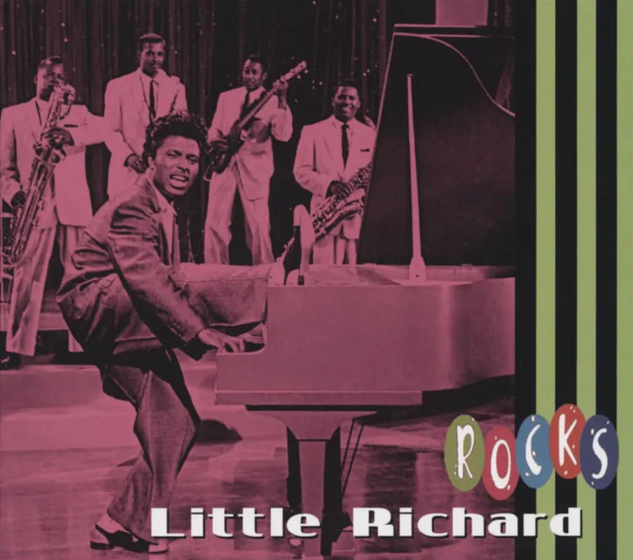 Little Richard performing dynamically at his piano, embodying the explosive energy of early rock 'n' roll