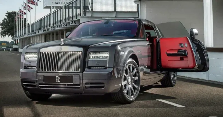 Luxury Rolls-Royce Phantom Coupe Chicane, featuring its sleek design with carbon fiber details and dark matte finish inspired by motorsport.