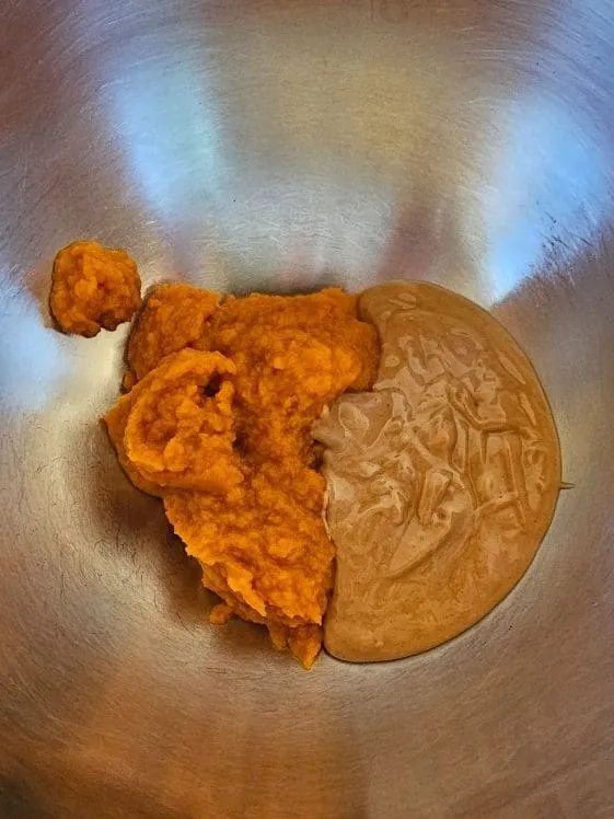 Mixing pumpkin puree and peanut butter, the first step for 3 ingredient no bake dog treats.