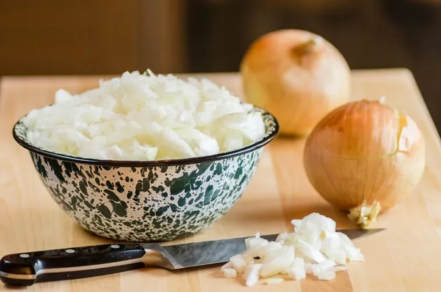 Onions and related plant species can make dogs and cats sick. John A Trax Jr/iStockphoto