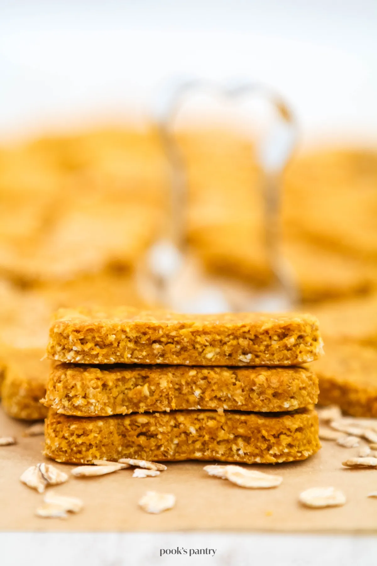 Perfectly baked pumpkin and oat dog treats, showing their wholesome texture.