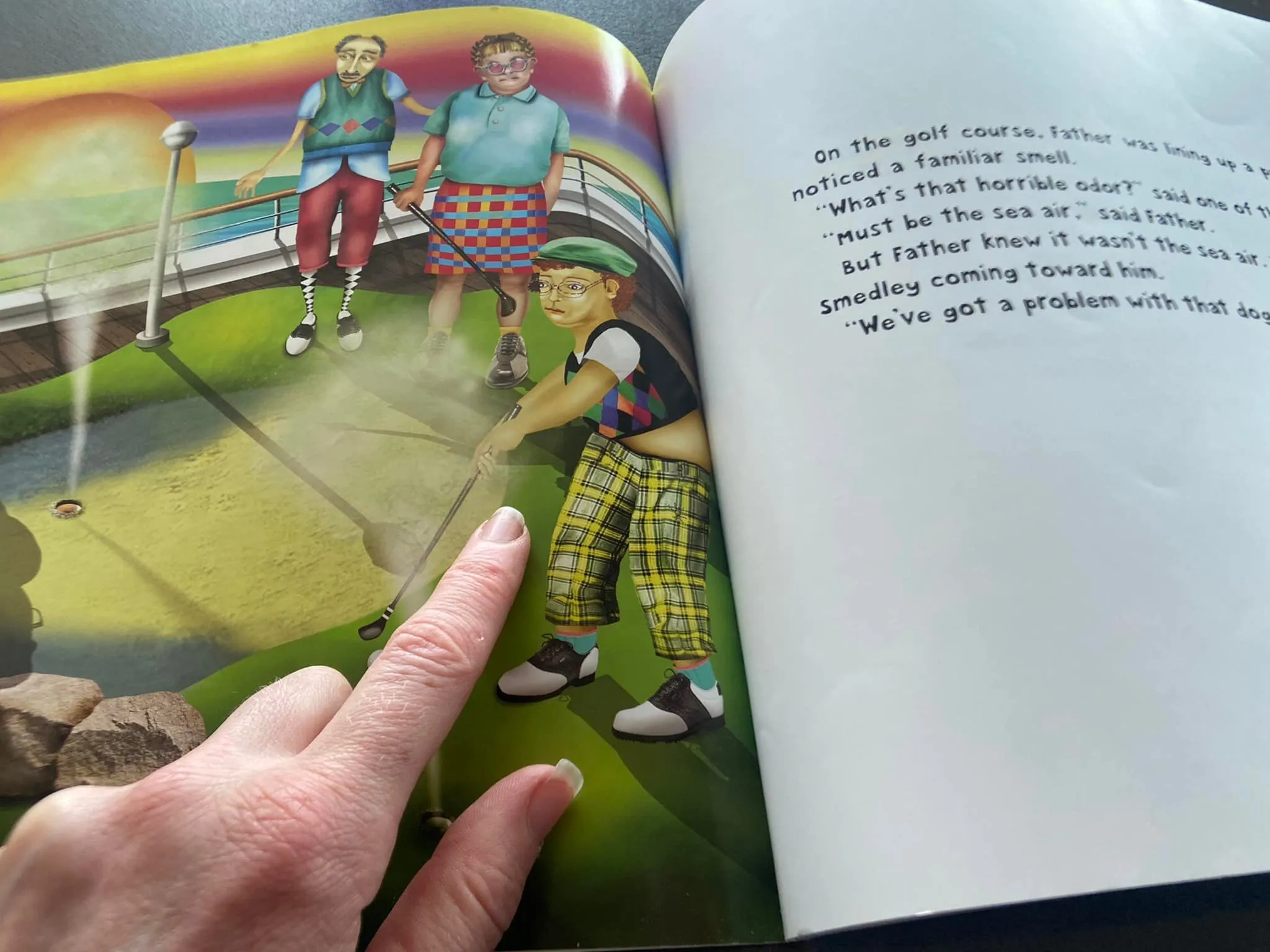 Prof. Cruise pointing at a photo of Father in his golf outfit from the book.