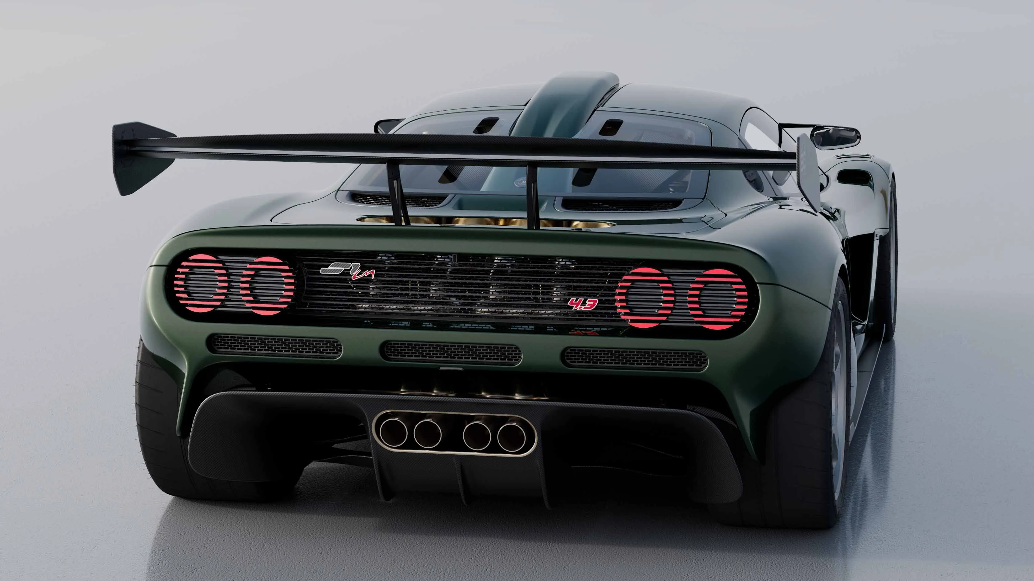 Rear view of the GMSV S1 LM with fixed dual-plane wing, quad exhausts, and round taillights, echoing the new McLaren F1 spirit