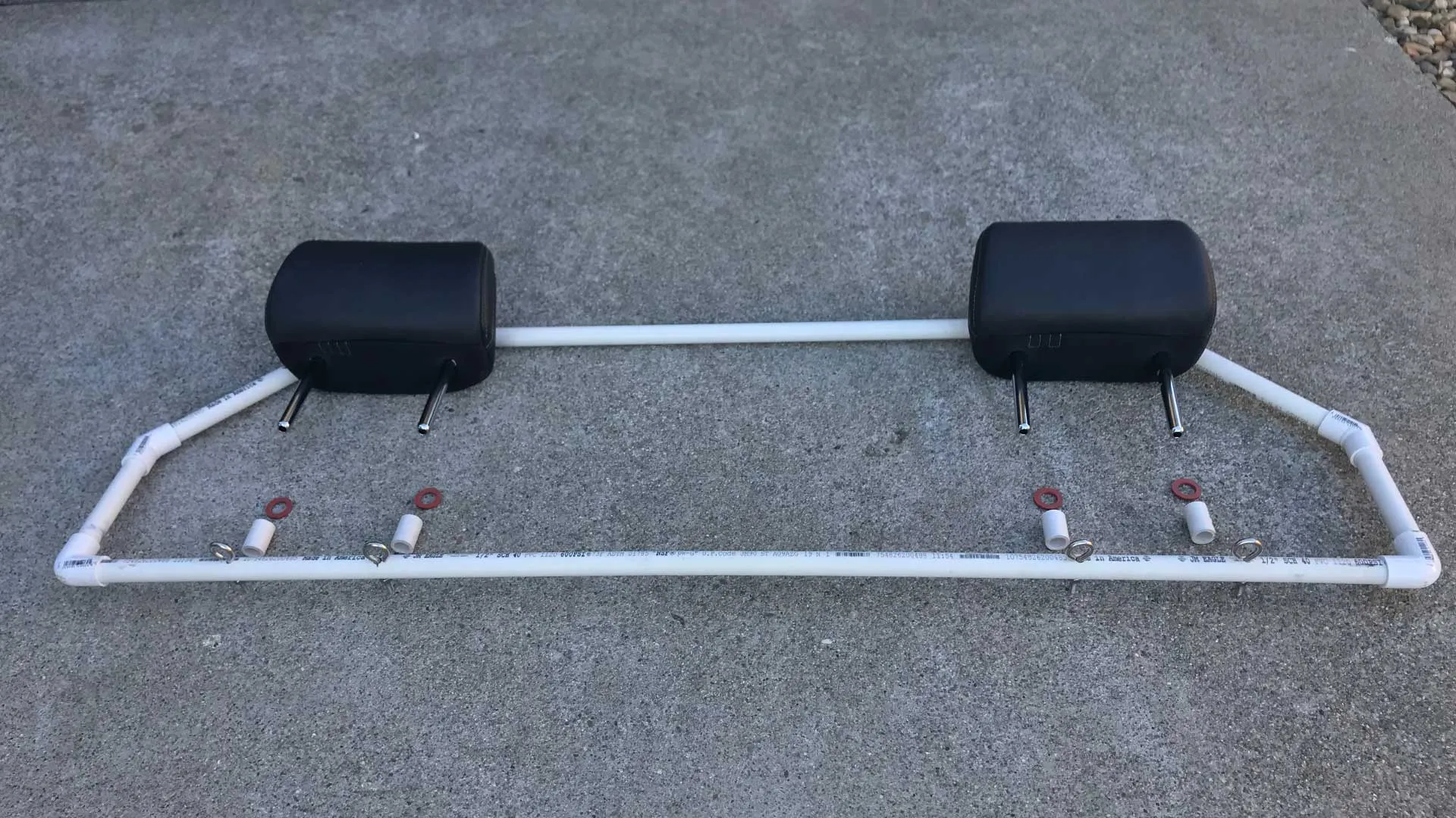 Securing the frame with eyebolts for a DIY dog car barrier