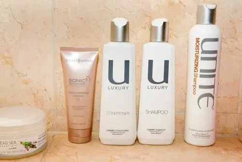 Selena Gomez using her Clarisonic in the shower