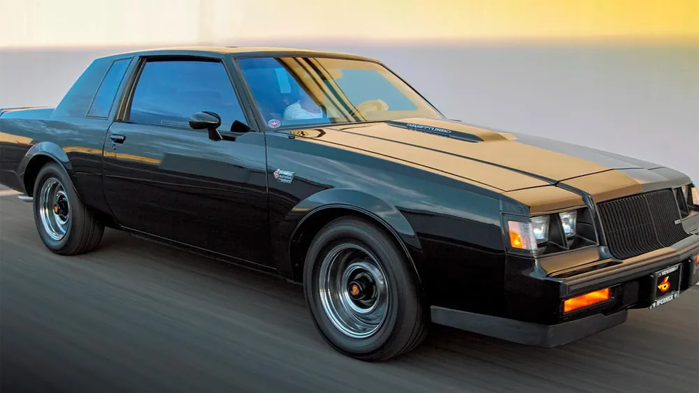 Sleek black 1987 Buick GNX in profile