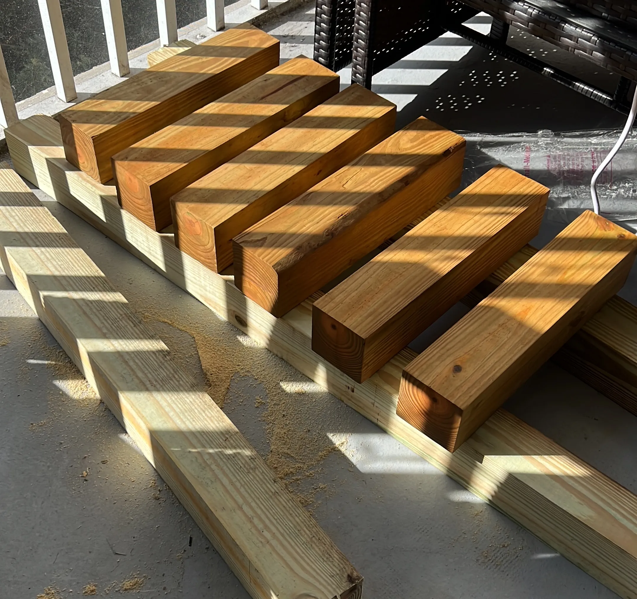 Stain applied to the wood for the base