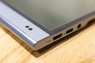 The ASUS ZenScreen MQ16AH portable monitor illustrating its lightweight design, easy to carry for any mobile professional