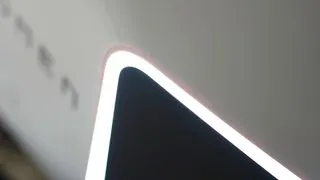 The back of the HP Omen Transcend 32 OLED monitor, revealing its clean aesthetic and gaming-inspired design elements