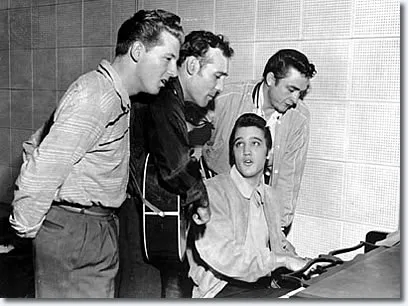 The "Million Dollar Quartet" in an iconic pose: Jerry Lee Lewis, Carl Perkins, Elvis Presley, and Johnny Cash