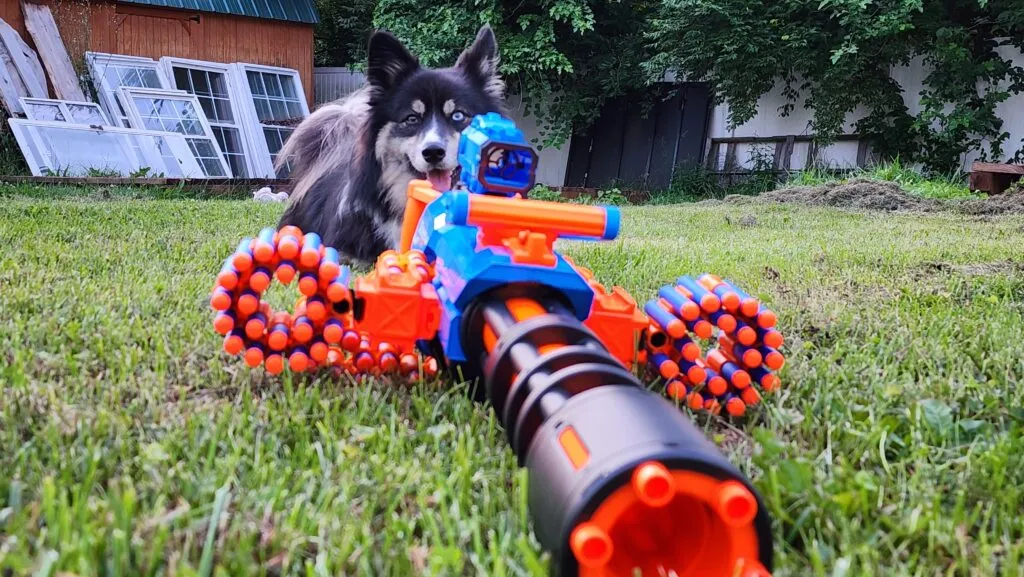 The X-Shot Insanity Rage Fire with attachments connected via Picatinny rail