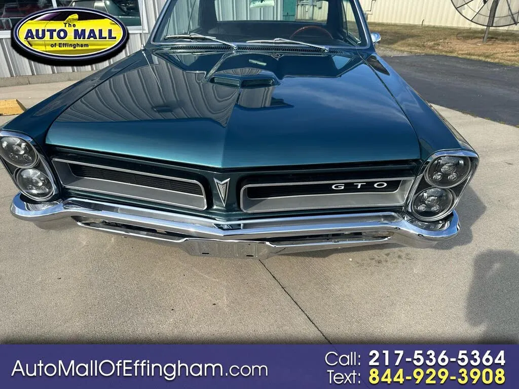 Turquoise 1965 Pontiac GTO coupe exterior detail