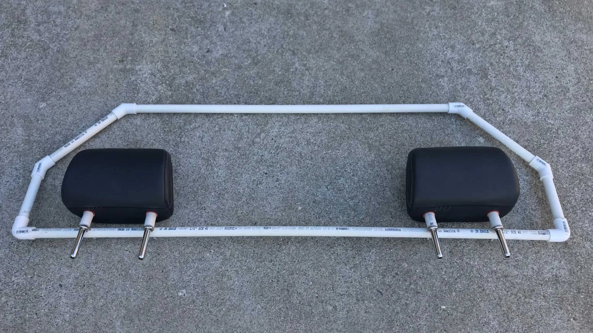 Using washers and PVC spacers to secure the barrier