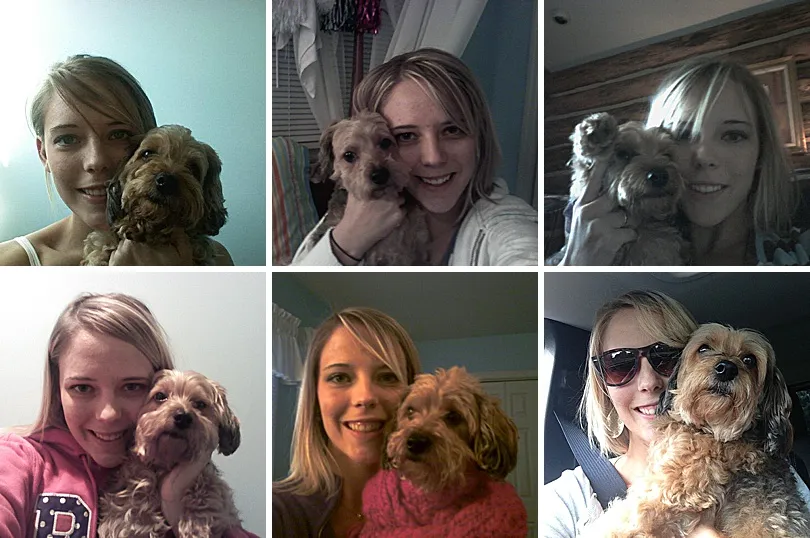 Yorkiepoo, Sophie, posing for a selfie with a family member, showing her cooperative nature.
