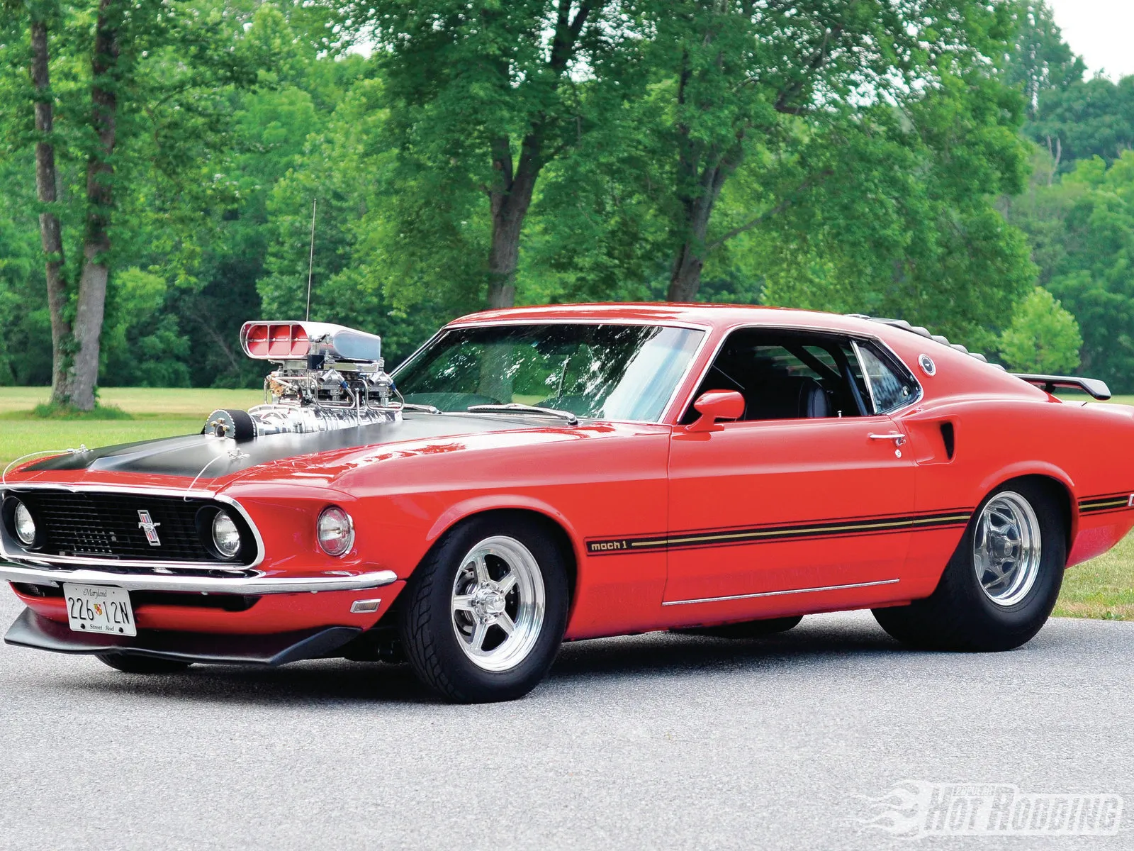 1969 Ford Mach I Mustang in green, a powerful Pro Street cruiser with a large blower