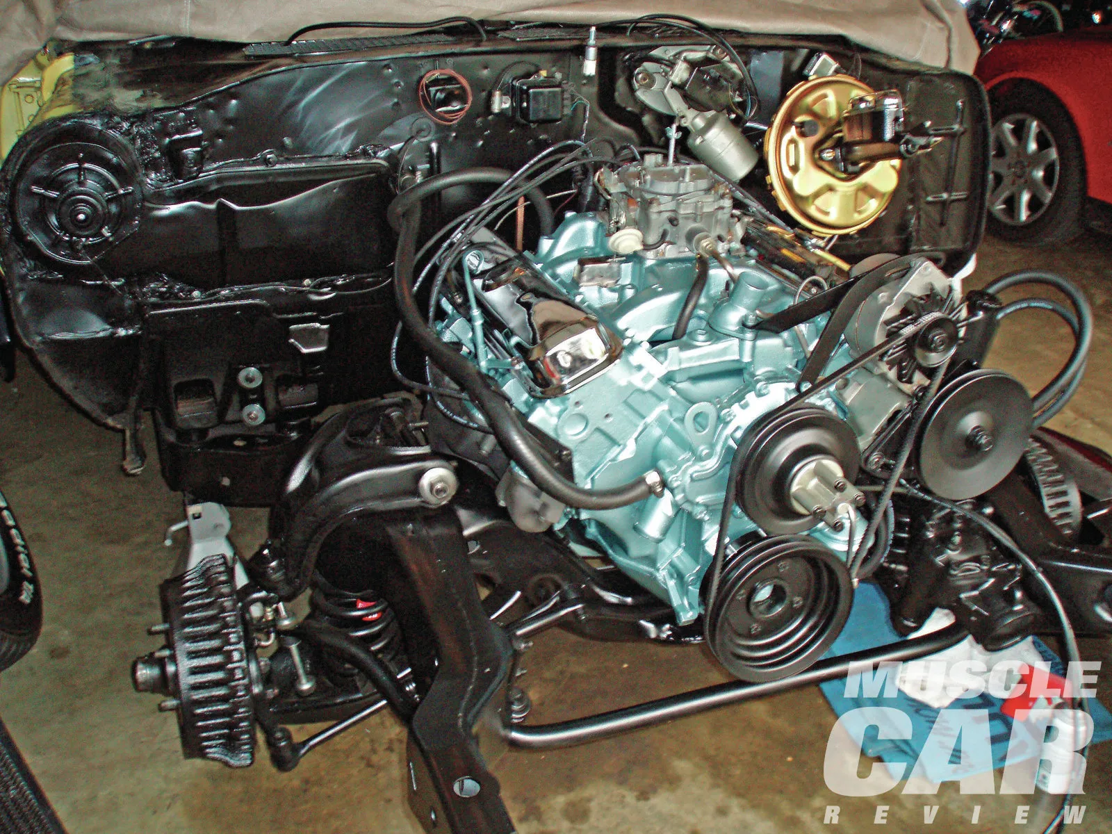 1969 Pontiac GTO Judge chassis and Ram Air engine during assembly