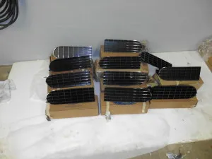 1970-71 Torino NOS hide-a-way headlight doors, a sought-after original component for restoration