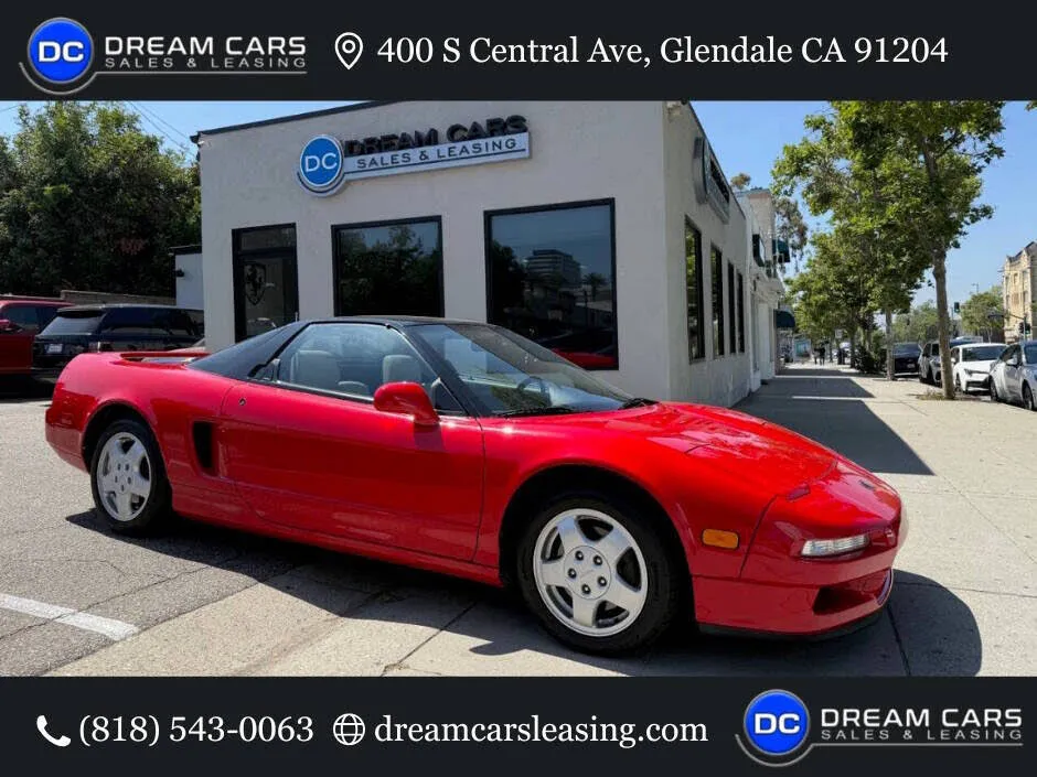 2005-yellow-Honda-NSX 2005 Yellow Honda NSX on road profile view Via: Honda