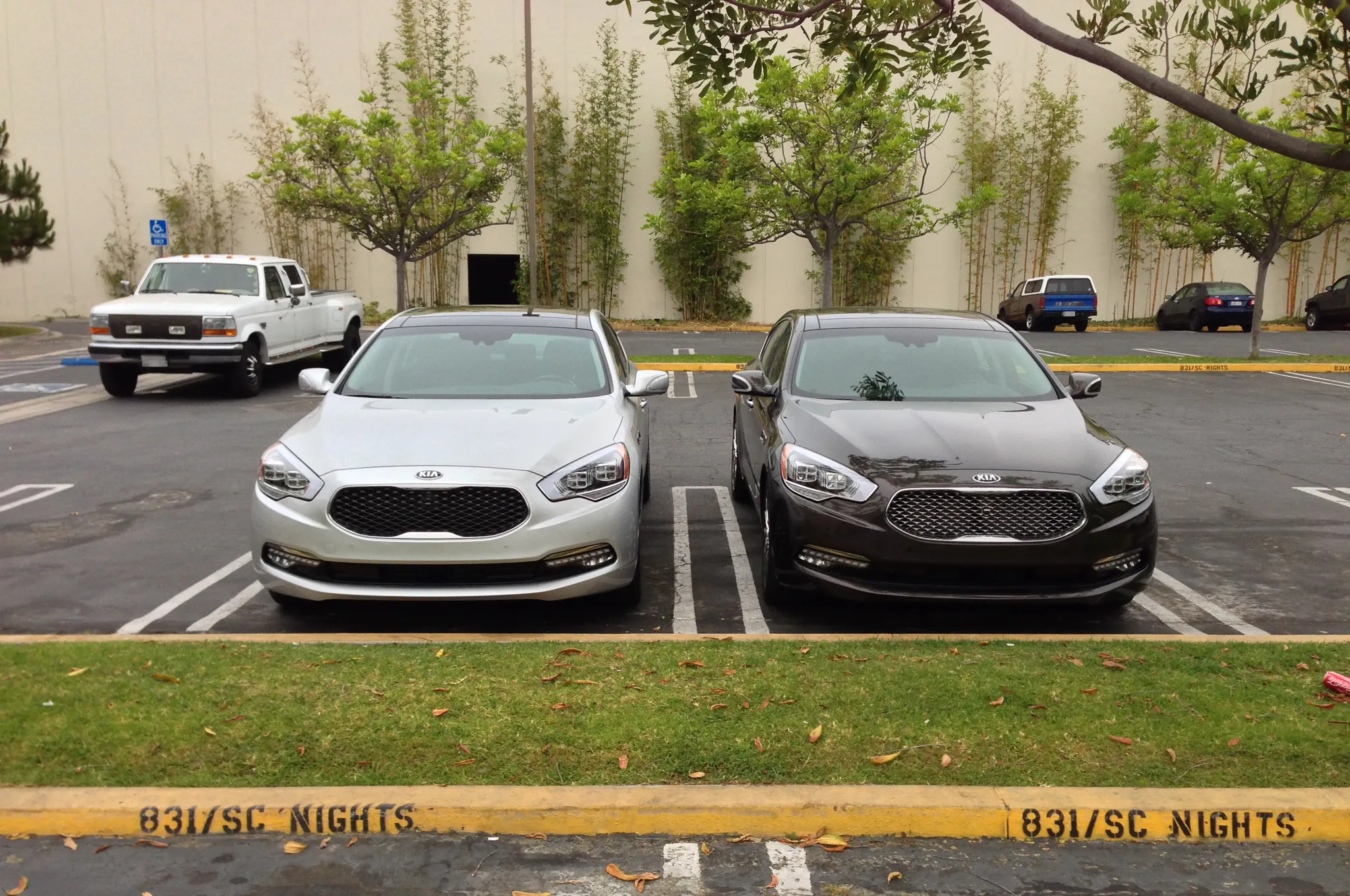 2015 Kia K900 V8 luxury sedan with a sleek design and prominent grille
