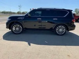 2017 INFINITI QX80 RWD black full-size SUV emphasizing spacious interior