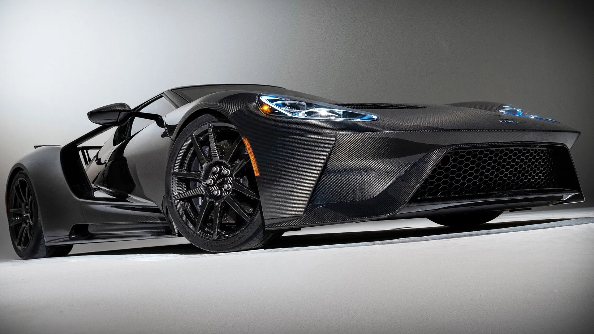 2022 Ford GT low front angle in a dynamic studio shot