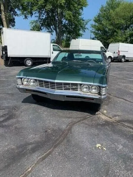 A beautifully restored 1966 Chevrolet Caprice in Marina Blue, showcasing its classic design