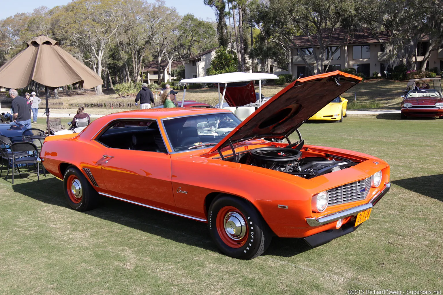 A classic 1969 Chevrolet Camaro ZL1 captured from a dynamic side profile