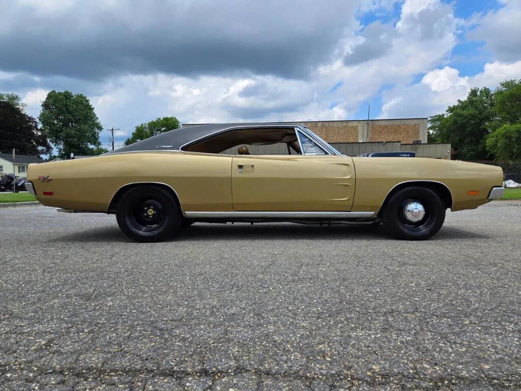 A classic 1969 Dodge Charger in a vibrant red color
