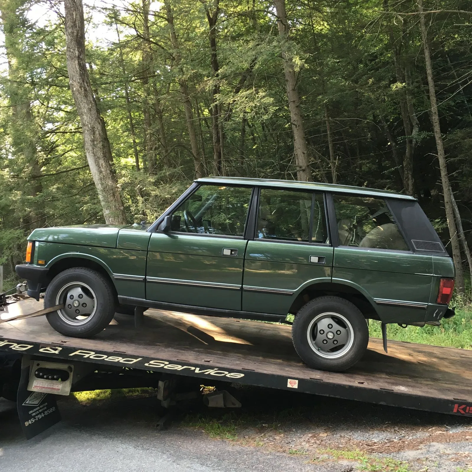 A classic Range Rover County in Ardennes Green Metallic in its natural habitat