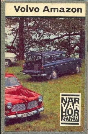 A classic red Volvo P1800 convertible modified by Volvoville, parked outdoors.