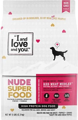 A close-up of a bowl of I and Love and You Red Meat Medley dry dog food kibble.