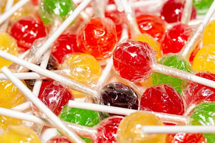 A colorful assortment of hard candies and lollipops, a great mess-free gaming treat