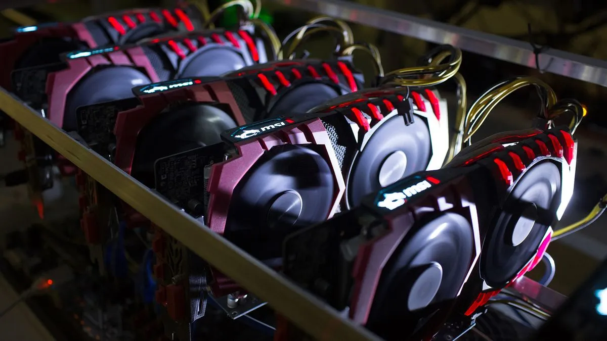 A cryptocurrency mining rig composed of Asus Strix machines operates at the SberBit mining