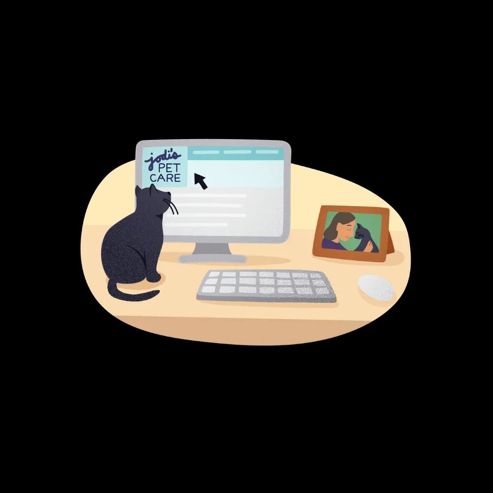 A desktop computer displaying a pet sitting website, with various graphics and design elements visible, alongside a notebook and pen.