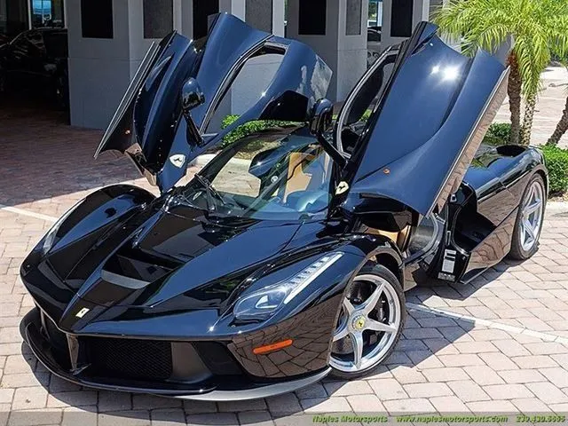 A Pagani Huayra with its doors open.