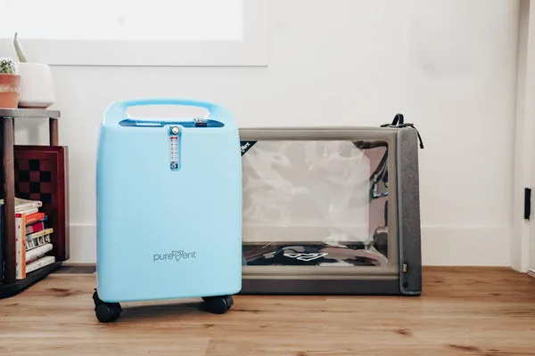 A PureVent oxygen chamber and concentrator, ready to provide respiratory support for a dog with heart conditions.