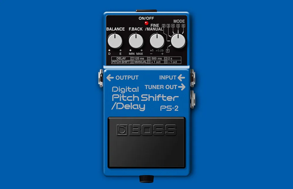 A purple BOSS PS-2 Digital Pitch Shifter/Delay pedal, featuring multiple knobs for pitch and delay parameters