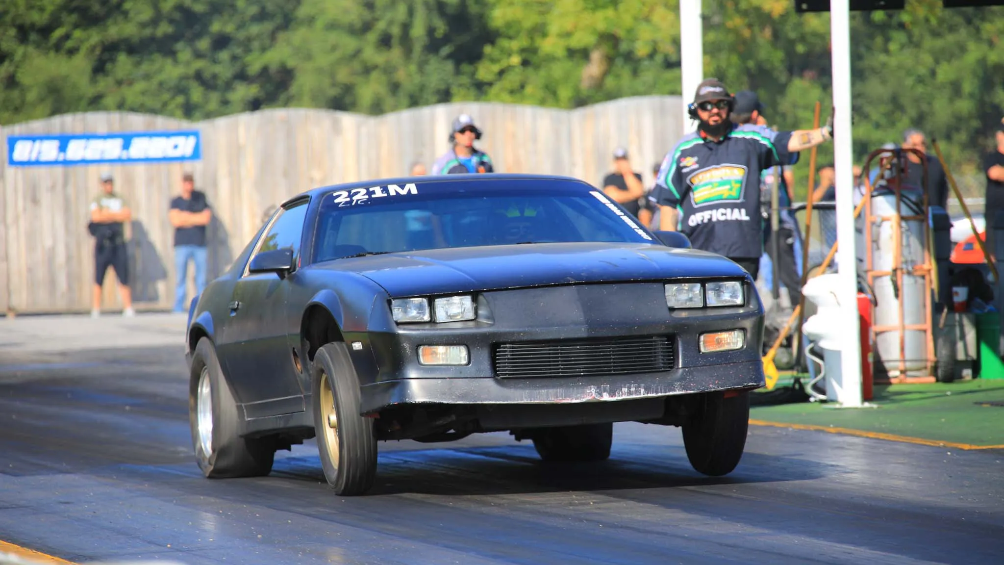 A red third-generation Chevrolet Camaro