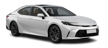A sleek grey Toyota Camry hybrid sedan parked on a city street during the day