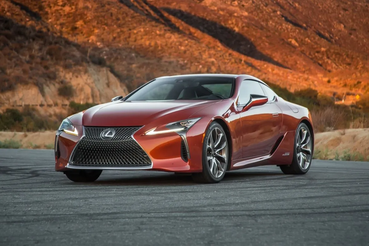 A sleek silver Lexus LC Hybrid coupe parked outdoors