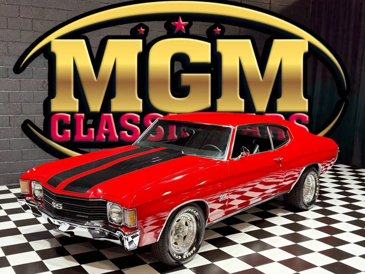 A striking red 1972 Chevrolet Chevelle coupe, showcasing the model's classic muscle car lines and powerful stance.